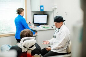 Dr. Harrie consulting with a Fargo restorative dentistry patient.