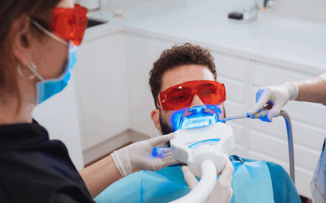 A young man recieving laser dental treatment in Fargo.