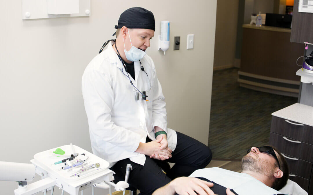 Our Fargo area dentist consulting with a patient on cosmetic dental treatment.
