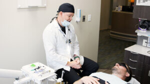 Our Fargo area dentist consulting with a patient on cosmetic dental treatment.